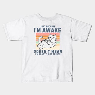 Just Because I'm Awake Doesn't Mean I'm Ready To Do Things. Retro design With a Cute cat drinking coffee. Kids T-Shirt